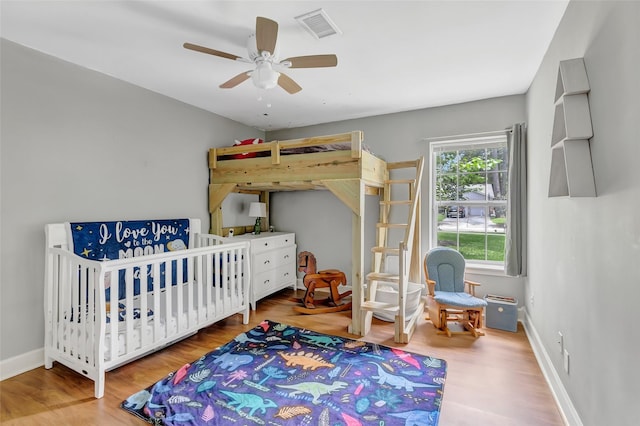 2138 Middle Creek Dr, Houston, TX 77339 - bedroom with wood finished floors, ceiling fan, and baseboards