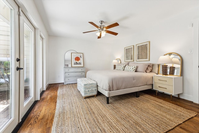 7811 Skyline Dr, Houston, TX 77063 - bedroom featuring dark wood-style flooring, baseboards, and ceiling fan