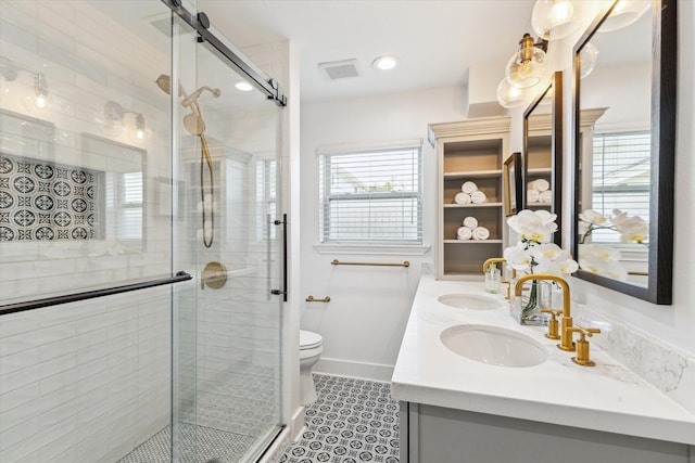 7811 Skyline Dr, Houston, TX 77063 - bathroom featuring double vanity, a shower stall, toilet, and tile patterned flooring