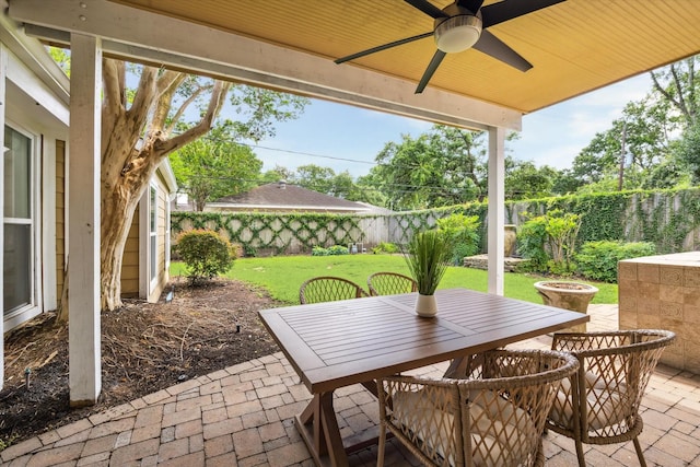 7811 Skyline Dr, Houston, TX 77063 - view of patio / terrace featuring outdoor dining area and ceiling fan