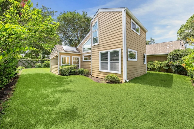 7811 Skyline Dr, Houston, TX 77063 - rear view of house with a lawn