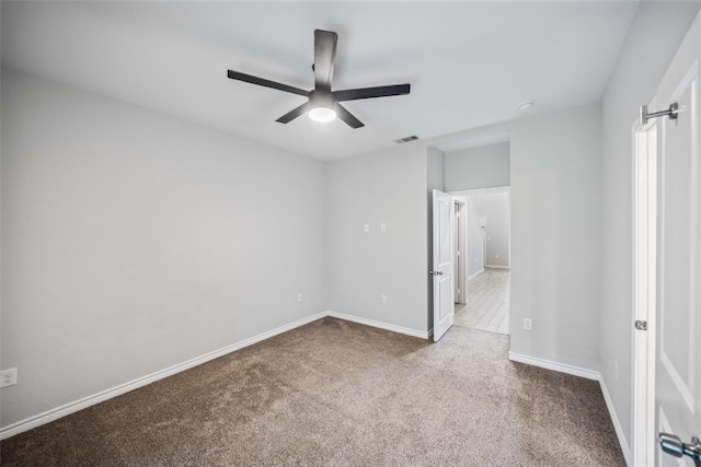 4006 Frontier Rd, Willis, TX 77378 - empty room with carpet floors, ceiling fan, and baseboards