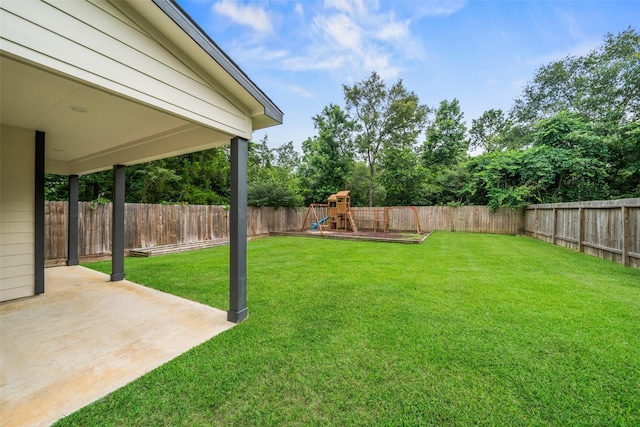 4006 Frontier Rd, Willis, TX 77378 - view of yard featuring a patio and a playground