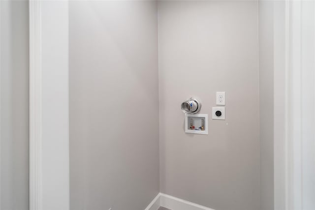 14515 Redbud Valley Trl, Houston, TX 77062 - laundry area with hookup for an electric dryer, washer hookup, and baseboards