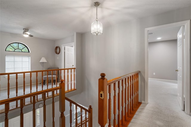 14515 Redbud Valley Trl, Houston, TX 77062 - hallway with an upstairs landing, carpet flooring, and baseboards