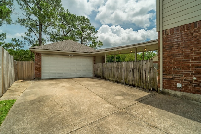 14515 Redbud Valley Trl, Houston, TX 77062 - garage with concrete driveway