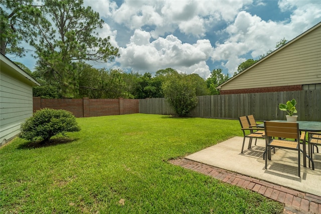 14515 Redbud Valley Trl, Houston, TX 77062 - view of yard featuring a patio area and outdoor dining space