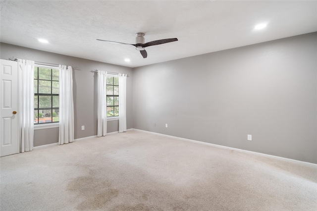 14515 Redbud Valley Trl, Houston, TX 77062 - unfurnished room with a ceiling fan, recessed lighting, light carpet, and baseboards