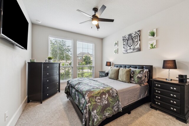 28243 Shorecrest Ln, Katy, TX 77494 - carpeted bedroom with a ceiling fan and baseboards