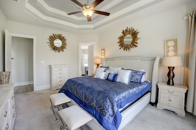 28243 Shorecrest Ln, Katy, TX 77494 - bedroom featuring light colored carpet, a raised ceiling, crown molding, ceiling fan, and baseboards