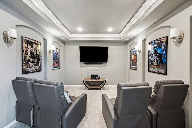 28243 Shorecrest Ln, Katy, TX 77494 - cinema room featuring a tray ceiling, ornamental molding, baseboards, and recessed lighting