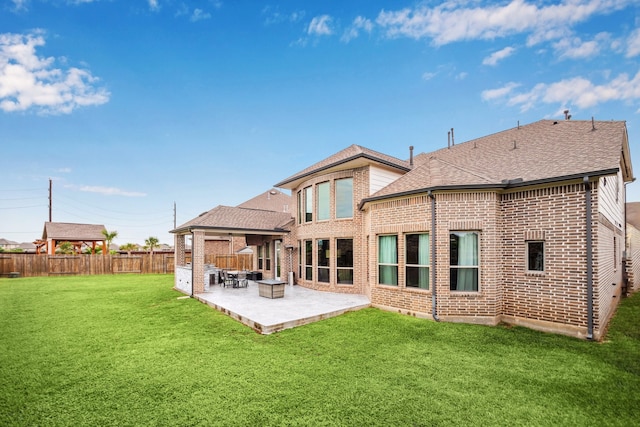 28243 Shorecrest Ln, Katy, TX 77494 - back of property featuring brick siding, a shingled roof, a patio, and ceiling fan
