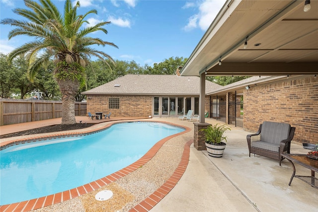 2205 Erin Glen Ct, Deer Park, TX 77536 - view of pool featuring a patio