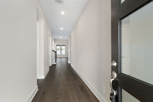 5115 Prairie Gourd Mdw, Manvel, TX 77578 - hall featuring dark wood-style floors, recessed lighting, baseboards, and stairs