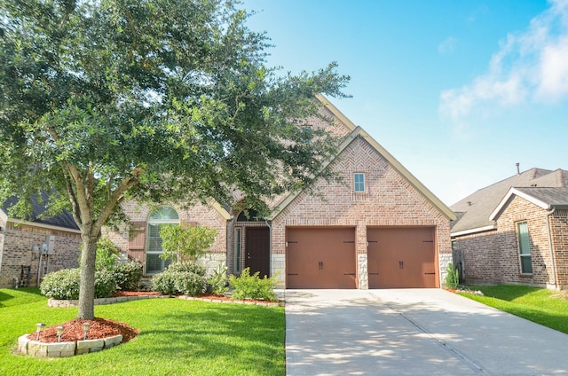 13806 Crystal Harbor Ln, Pearland, TX 77584 - view of front of house with brick siding, driveway, a front lawn, and an attached garage