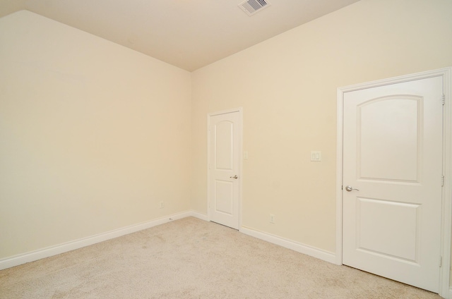 13806 Crystal Harbor Ln, Pearland, TX 77584 - unfurnished room with light carpet, vaulted ceiling, and baseboards