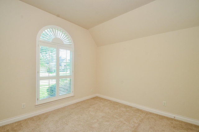 13806 Crystal Harbor Ln, Pearland, TX 77584 - carpeted spare room featuring lofted ceiling and baseboards