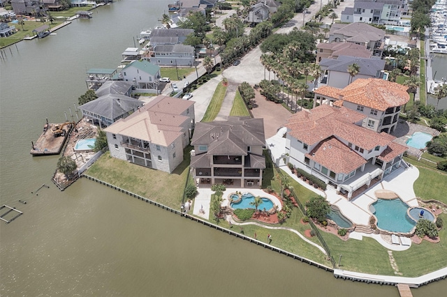 2242 Marina Way, League City, TX 77565 - aerial view of property and surrounding area featuring nearby suburban area, a pool area, and a large body of water