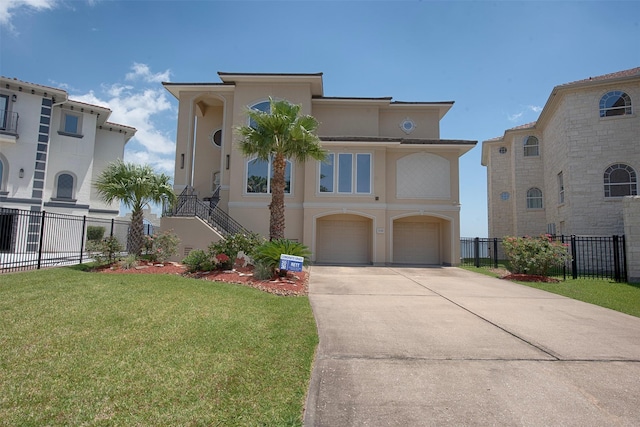 2242 Marina Way, League City, TX 77565 - mediterranean / spanish house featuring stucco siding, a garage, and driveway