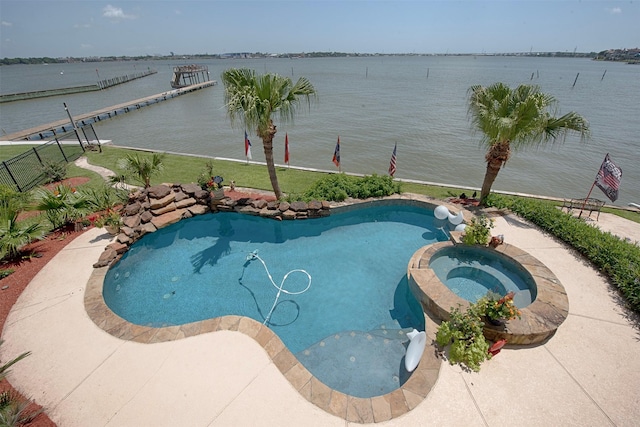 2242 Marina Way, League City, TX 77565 - view of swimming pool featuring a pool with connected hot tub and a water view