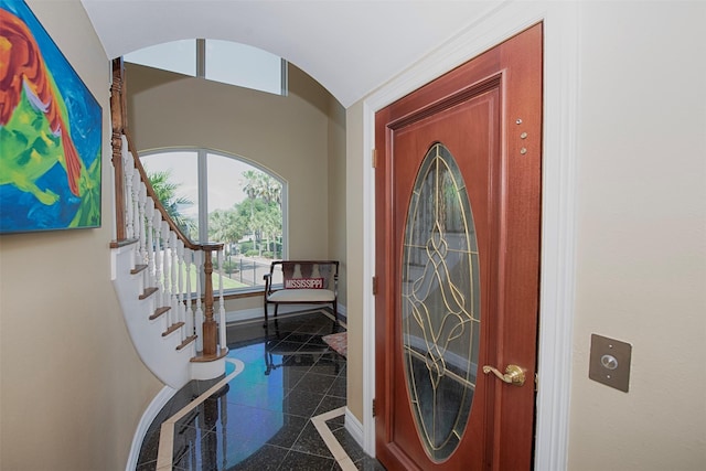 2242 Marina Way, League City, TX 77565 - entryway featuring granite floors, baseboards, stairway, and arched walkways