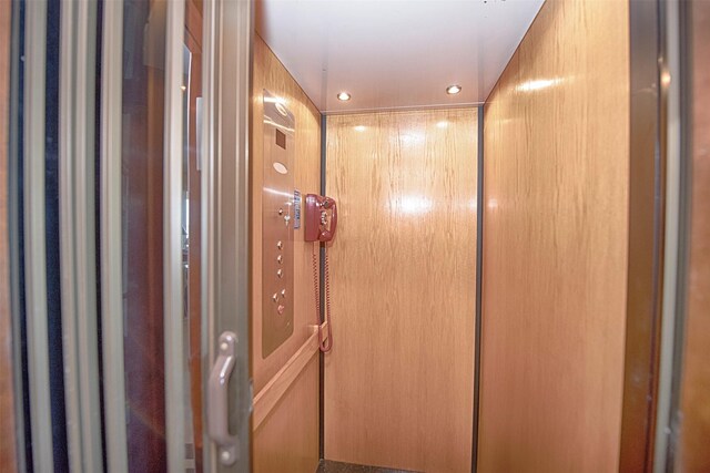 2242 Marina Way, League City, TX 77565 - elevator with recessed lighting