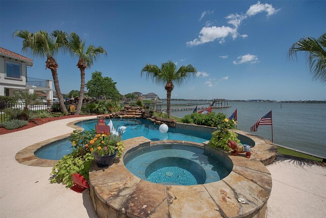 2242 Marina Way, League City, TX 77565 - view of pool with a pool with connected hot tub and a water view