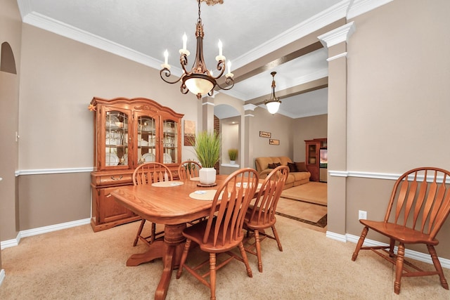 18110 Dovefield Ln, Cypress, TX 77433 - dining space with ornate columns, arched walkways, crown molding, baseboards, and light carpet