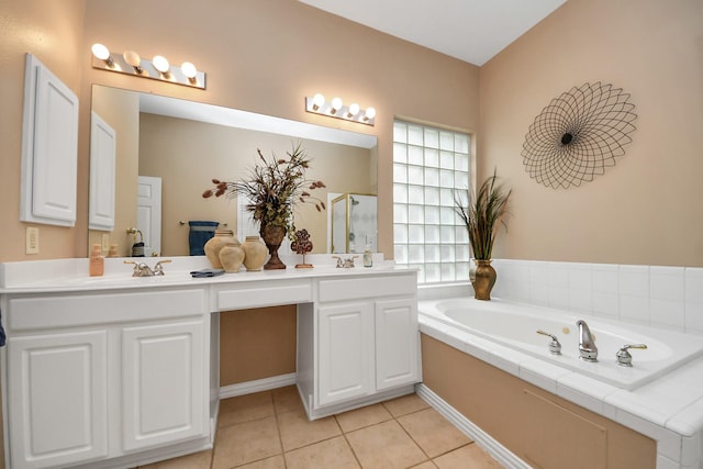 18110 Dovefield Ln, Cypress, TX 77433 - full bath featuring double vanity, a garden tub, tile patterned flooring, and a shower with door