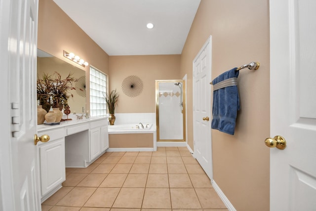18110 Dovefield Ln, Cypress, TX 77433 - bathroom with a shower stall, vanity, tile patterned flooring, and a garden tub