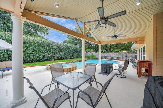 18110 Dovefield Ln, Cypress, TX 77433 - fenced backyard with ceiling fan, outdoor dining area, and a patio area