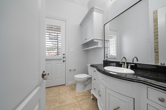 169 Westlake Pt, Montgomery, TX 77356 - bathroom with toilet, vanity, plenty of natural light, and tile patterned floors