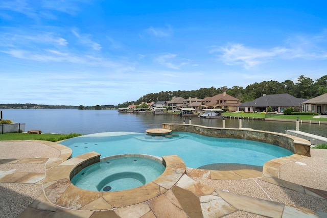 169 Westlake Pt, Montgomery, TX 77356 - view of swimming pool with a water view, a pool with connected hot tub, and a residential view