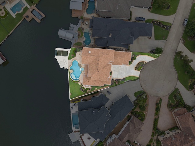169 Westlake Pt, Montgomery, TX 77356 - aerial overview of property's location with a pool area and a nearby body of water