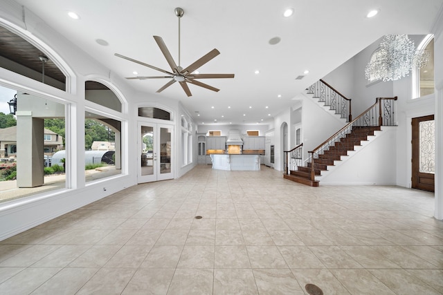 169 Westlake Pt, Montgomery, TX 77356 - unfurnished living room featuring stairs, recessed lighting, a ceiling fan, baseboards, and light tile patterned floors