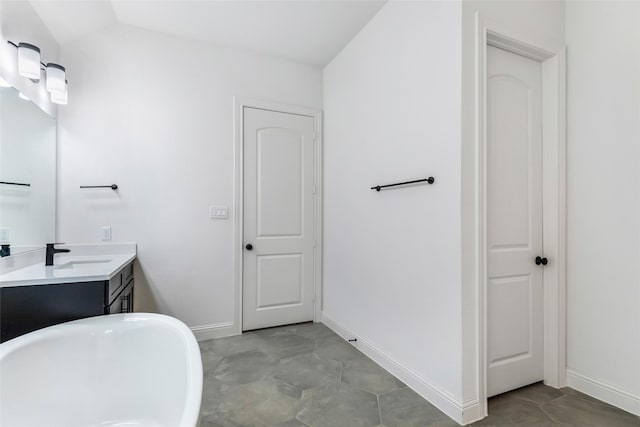 11914 Parsifal Creek Rd, Humble, TX 77346 - full bath with a freestanding bath, baseboards, and vanity