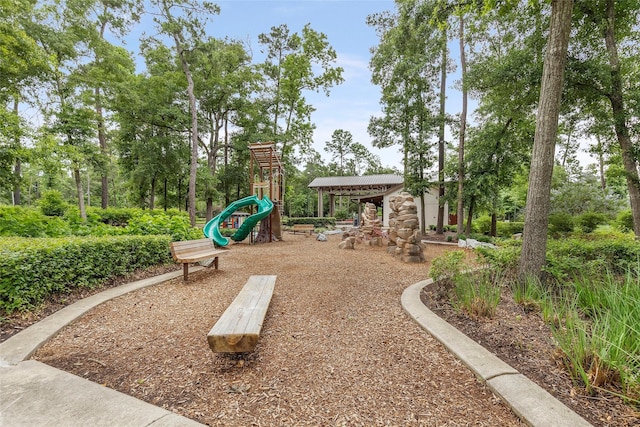 11914 Parsifal Creek Rd, Humble, TX 77346 - community jungle gym with view of wooded area