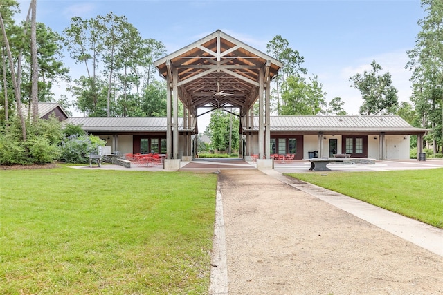 11914 Parsifal Creek Rd, Humble, TX 77346 - view of home's community featuring a yard, a patio, and an attached garage