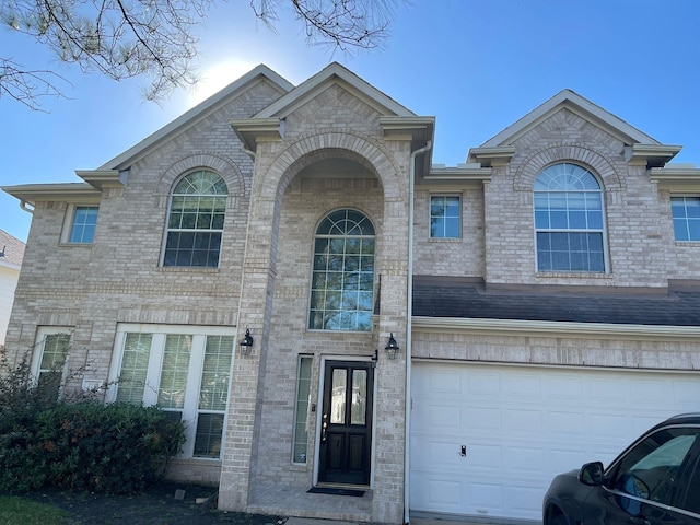 2710 Sienna Springs Dr, Pearland, TX 77584 - view of front of house with brick siding and a garage