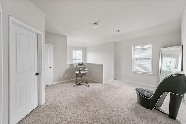 23659 Goodfellow Dr, Spring, TX 77373 - living area featuring carpet floors, baseboards, and an upstairs landing