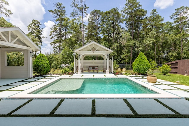 19276 Yellow Chestnut Ln, New Caney, TX 77357 - view of pool featuring a gazebo, a patio area, and view of scattered trees