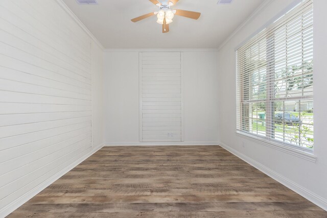 19276 Yellow Chestnut Ln, New Caney, TX 77357 - spare room featuring a ceiling fan, wood finished floors, ornamental molding, and baseboards