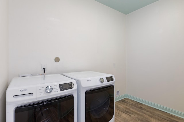 19276 Yellow Chestnut Ln, New Caney, TX 77357 - washroom featuring washer and dryer, wood finished floors, and baseboards