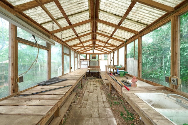 1103 Hillcrest Dr, Conroe, TX 77301 - unfurnished sunroom featuring lofted ceiling