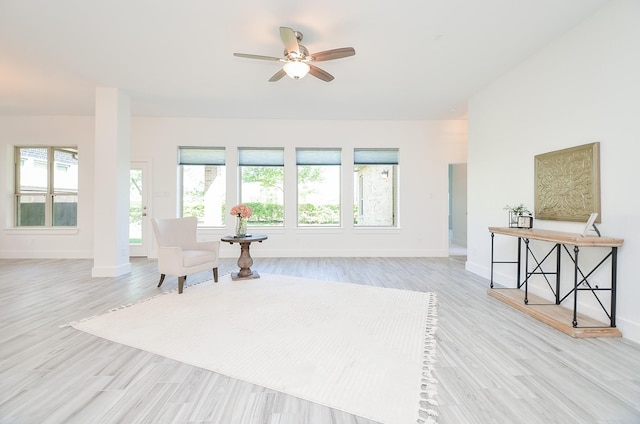 810 Sunbeam Creek Ct, Richmond, TX 77406 - living room with healthy amount of natural light, baseboards, and a ceiling fan