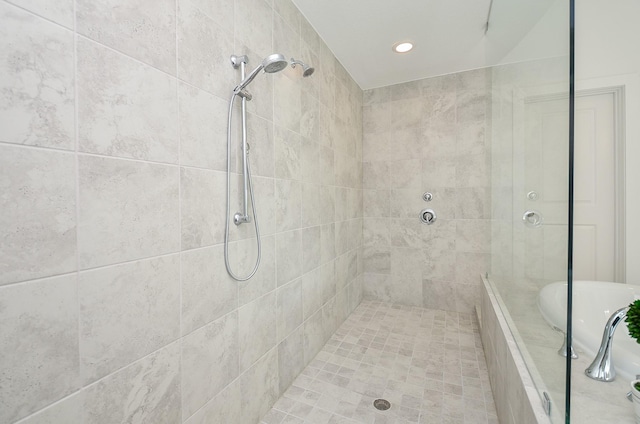 810 Sunbeam Creek Ct, Richmond, TX 77406 - bathroom with tiled shower and recessed lighting