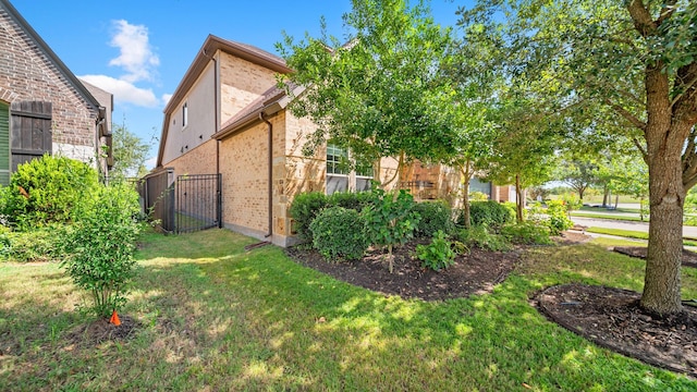 810 Sunbeam Creek Ct, Richmond, TX 77406 - view of home's exterior featuring a gate