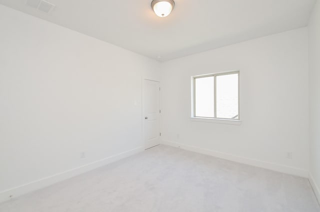 810 Sunbeam Creek Ct, Richmond, TX 77406 - spare room with baseboards and light carpet
