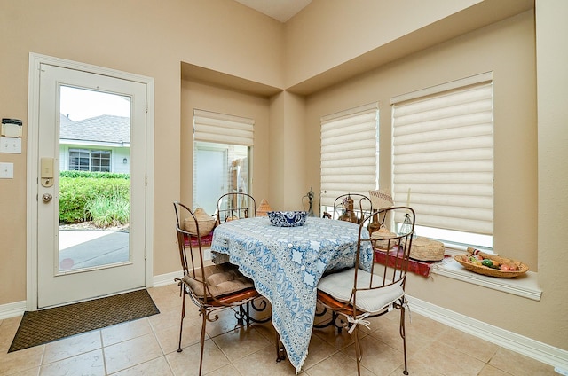 5703 Bent Arbor Ln, Katy, TX 77450 - tiled dining room featuring plenty of natural light and baseboards