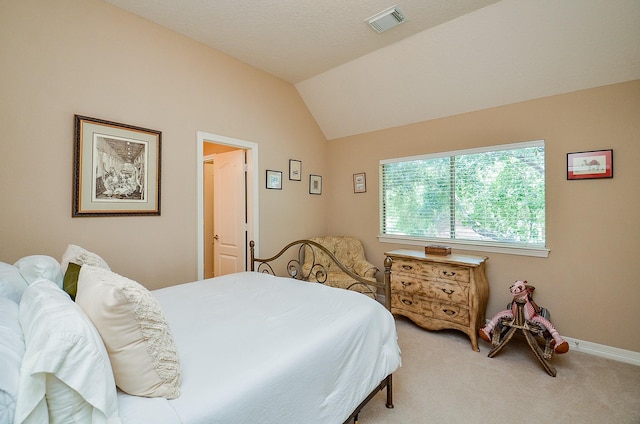 5703 Bent Arbor Ln, Katy, TX 77450 - bedroom with vaulted ceiling, carpet, and baseboards